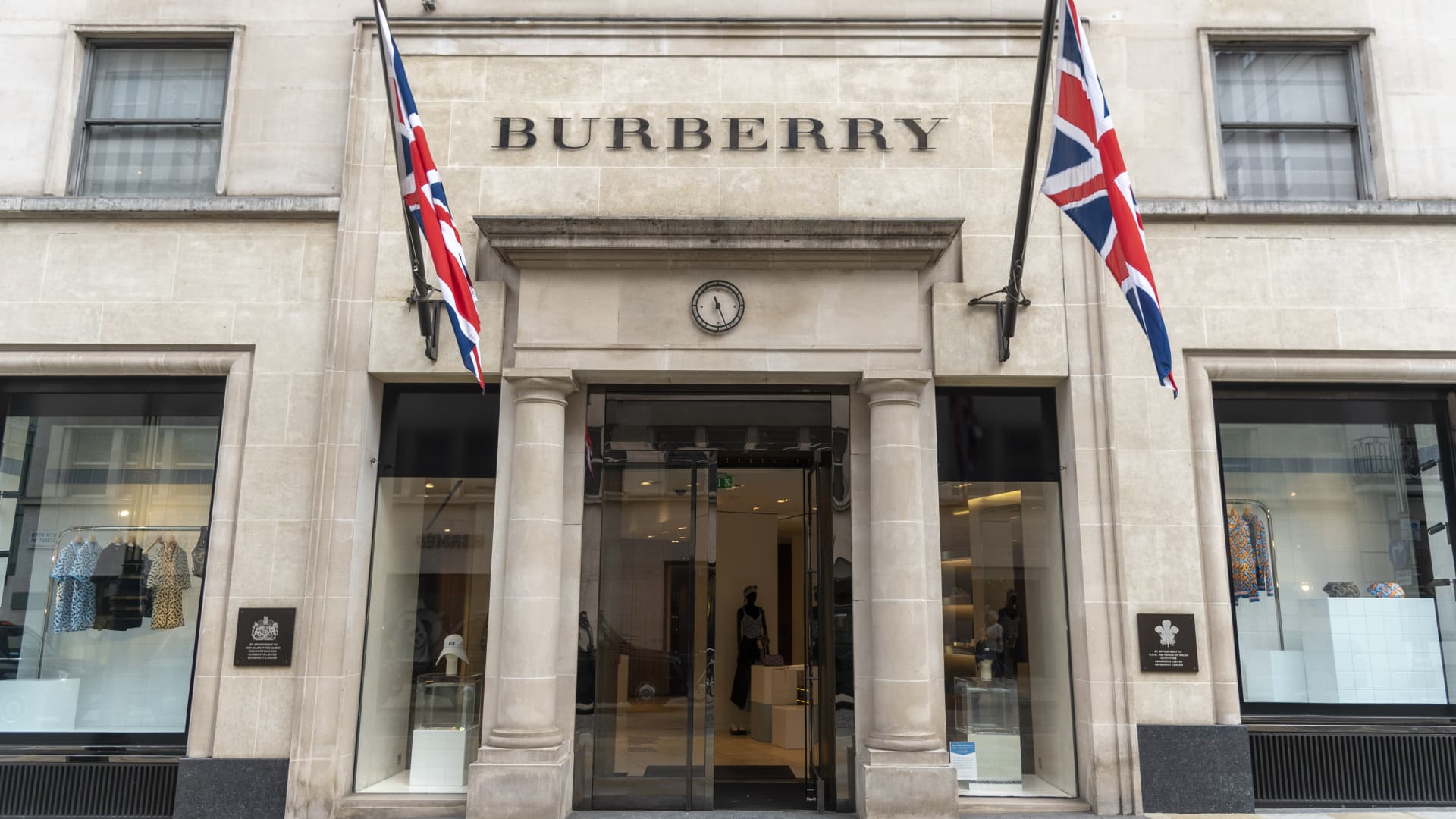 FTSE 100 drops struggling British luxury brand